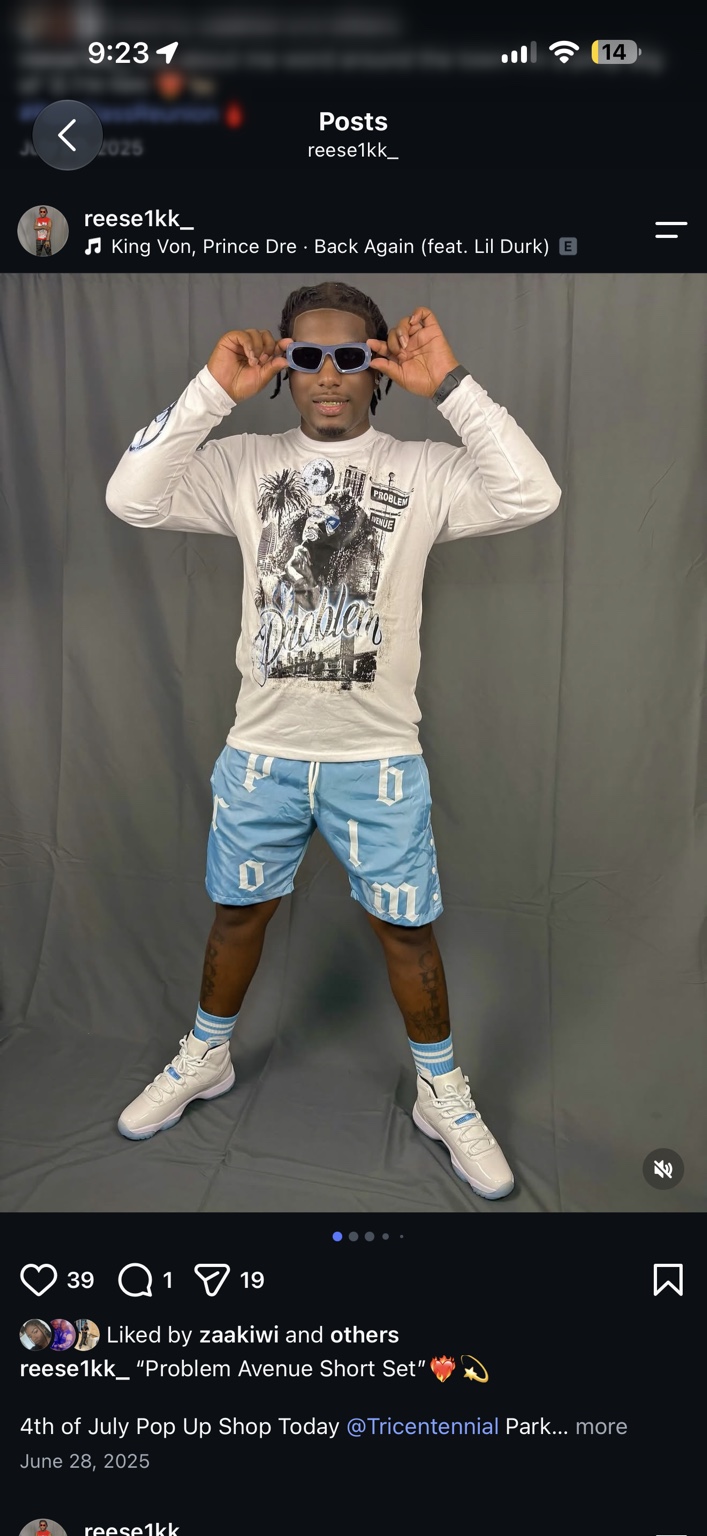 White long sleeve PROBLEM Avenue shirt with blue and white shorts, front