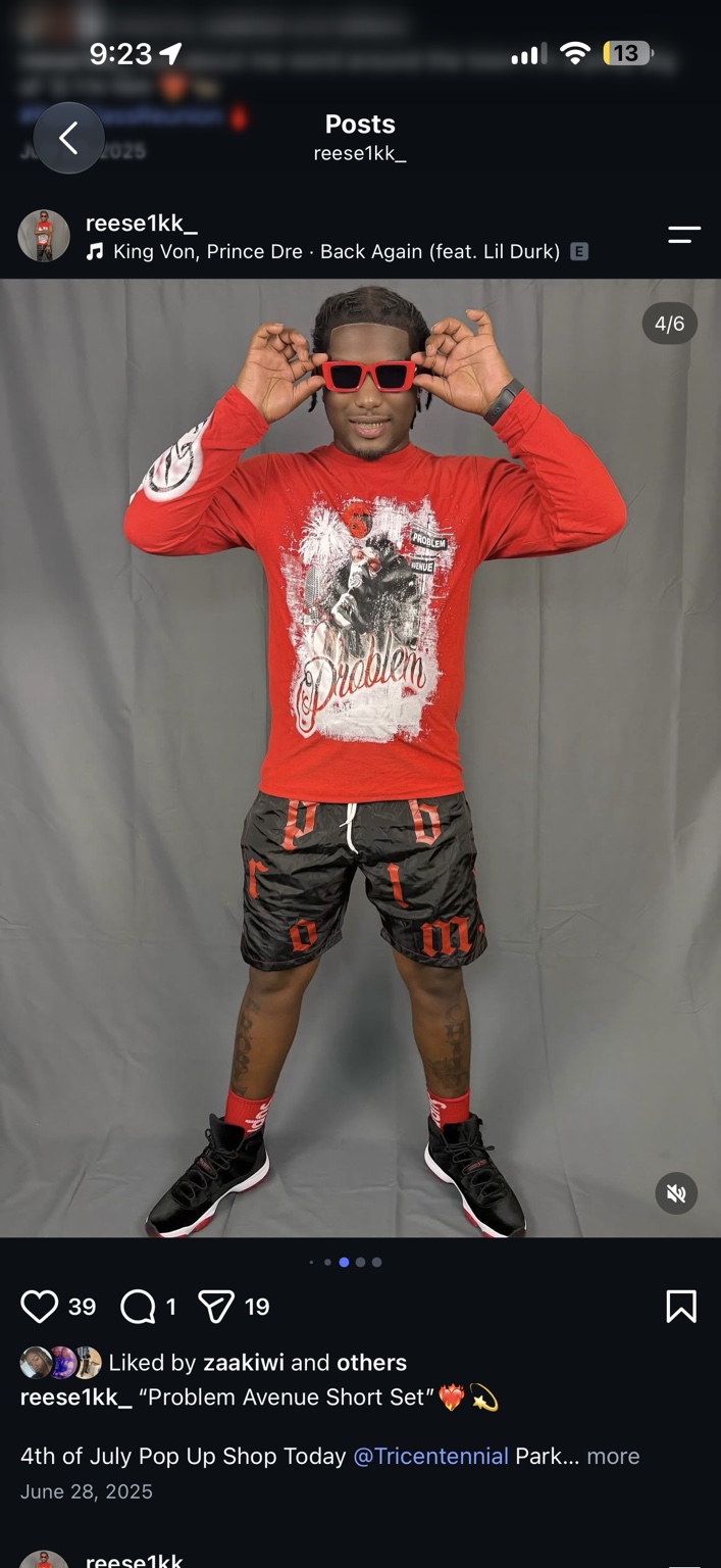 Red long sleeve PROBLEM Avenue shirt with black and red shorts, front